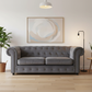 Grey 3-seater Chesterfield sofa in styled interior